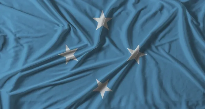 Gerahmter Druck : Flagge von Mikronesien mit Stofftexturhintergrund. Gerahmter Druck : Flagge von Mikronesien mit Stofftexturhintergrund.