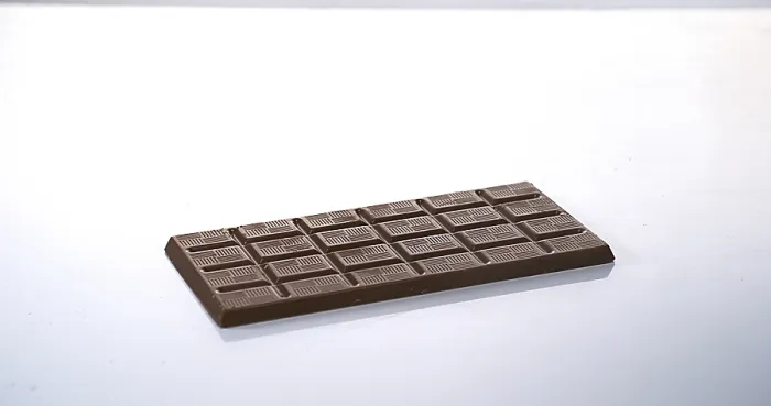 Gerahmter Druck : Milchschokoladen-Tablette Gerahmter Druck : Milchschokoladen-Tablette