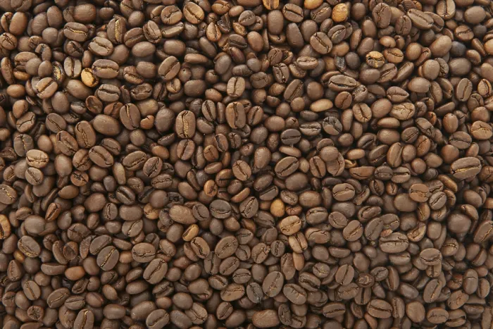 Gerahmter Druck : Ganze Kaffeebohnen als Hintergrund. Gerahmter Druck : Ganze Kaffeebohnen als Hintergrund.