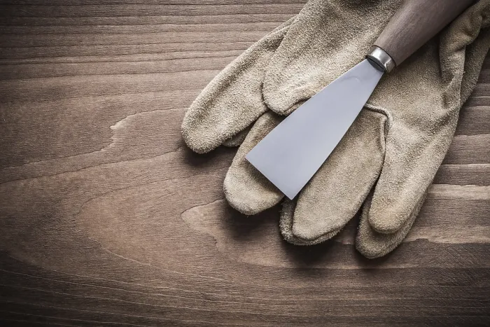 Gerahmter Druck : Schaber auf Arbeitsgloves Gerahmter Druck : Schaber auf Arbeitsgloves