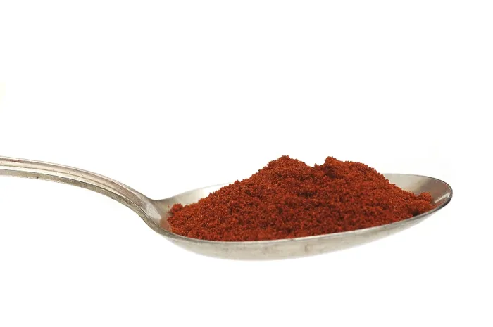 Gerahmter Druck : Paprika auf einem alten Löffel. Gerahmter Druck : Paprika auf einem alten Löffel.