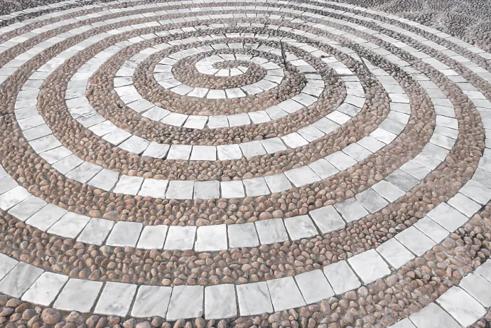 Gerahmter Druck : Kieselsteinmosaikfußboden mit Spiralmuster. Gerahmter Druck : Kieselsteinmosaikfußboden mit Spiralmuster.