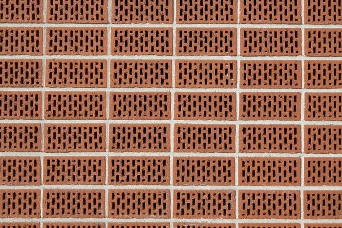 Gerahmter Druck : Perforierte Ziegelwand, Hintergrund.