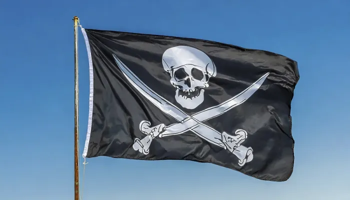 Gerahmter Druck : Die Piratensflagge flattert im Wind. Gerahmter Druck : Die Piratensflagge flattert im Wind.