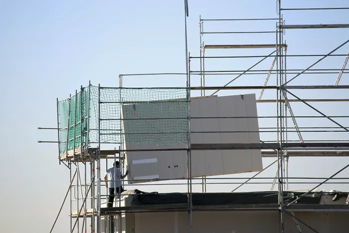 Gerahmter Druck : Vorfabrikat-Haus im Bau. Gerahmter Druck : Vorfabrikat-Haus im Bau.