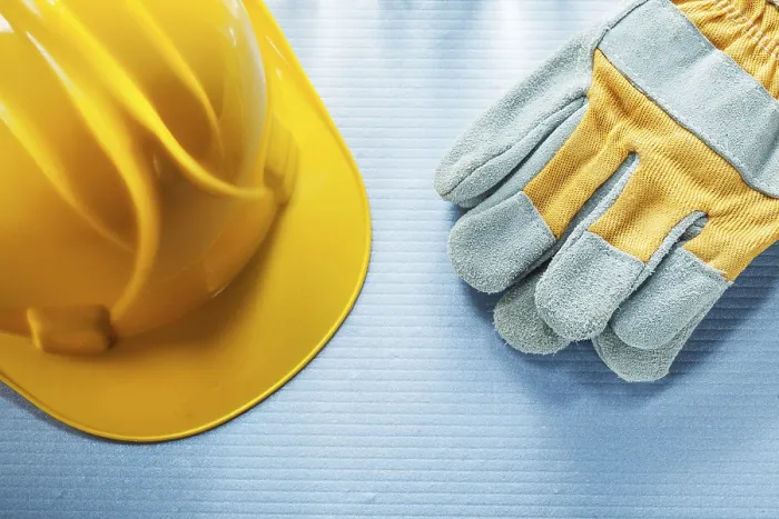 Gerahmter Druck : Schutzhandschuhe für den Bau. Gerahmter Druck : Schutzhandschuhe für den Bau.