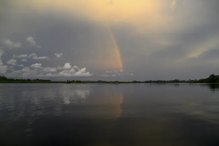 Gerahmter Druck : Regenbogen über der Iguela-Lagune Gerahmter Druck : Regenbogen über der Iguela-Lagune