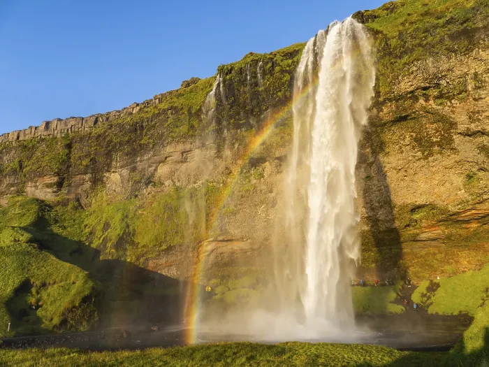 Gerahmter Druck : Regenbogen am Wasserfall von Seljalandsfoss Gerahmter Druck : Regenbogen am Wasserfall von Seljalandsfoss