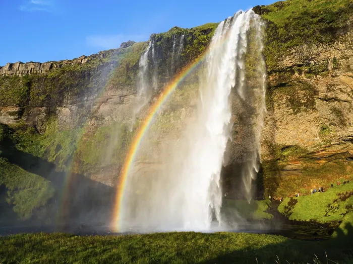 Gerahmter Druck : Regenbogen am Wasserfall von Seljalandsfoss Gerahmter Druck : Regenbogen am Wasserfall von Seljalandsfoss