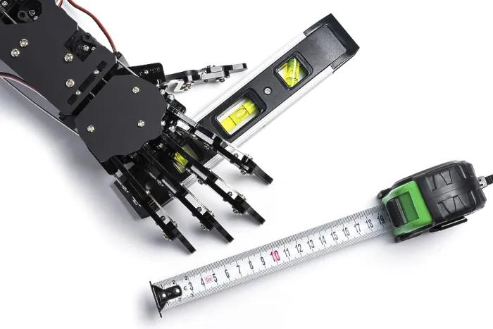 Gerahmter Druck : Reale Roboterhand mit Blasenlevel.