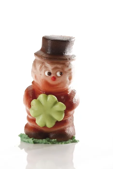 Gerahmter Druck : Kleiner Schornsteinfeger aus Marzipan. Gerahmter Druck : Kleiner Schornsteinfeger aus Marzipan.