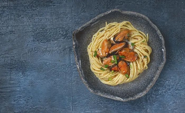 Gerahmter Druck : Spaghetti mit Muscheln, ohne Schale. Gerahmter Druck : Spaghetti mit Muscheln, ohne Schale.