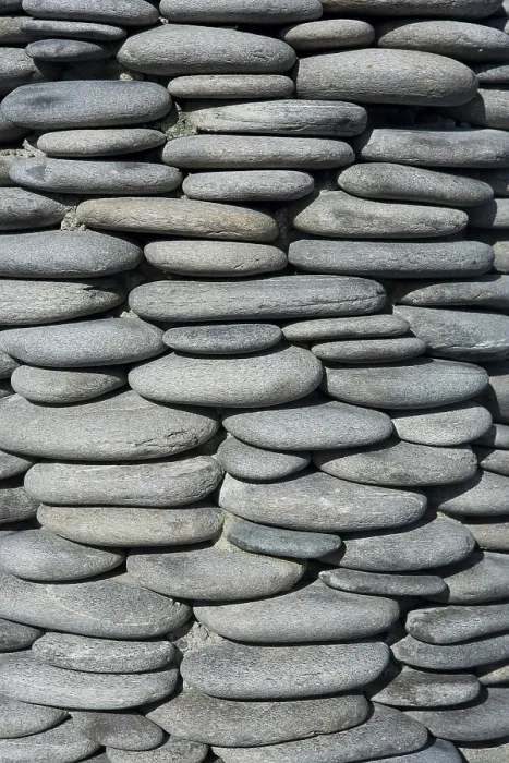 Gerahmter Druck : Steinmauer aus gerundeten Steinen. Gerahmter Druck : Steinmauer aus gerundeten Steinen.