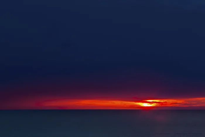 Gerahmter Druck : Sonnenuntergang bei den Bedruthan Steps, Cornwall.