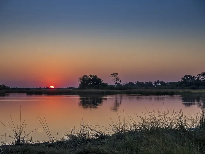 Gerahmter Druck : Sonnenuntergang in Okavango-Delta, Botswana. Gerahmter Druck : Sonnenuntergang in Okavango-Delta, Botswana.