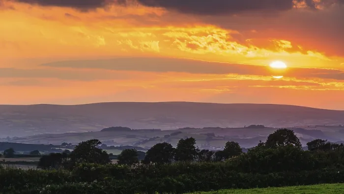 Gerahmter Druck : Sonnenuntergang über Torquay Fields, Devon.