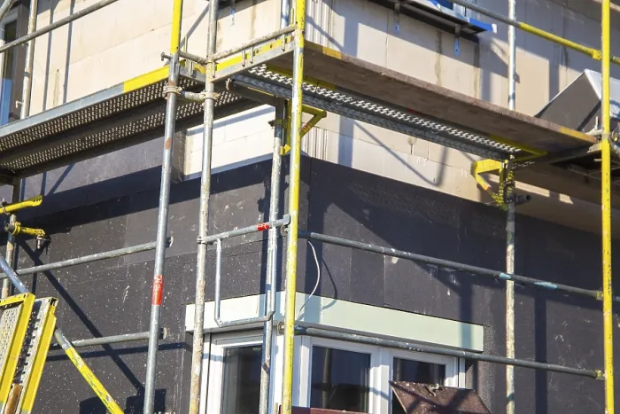 Gerahmter Druck : Wärmedämmung einer Hausfassade. Gerahmter Druck : Wärmedämmung einer Hausfassade.