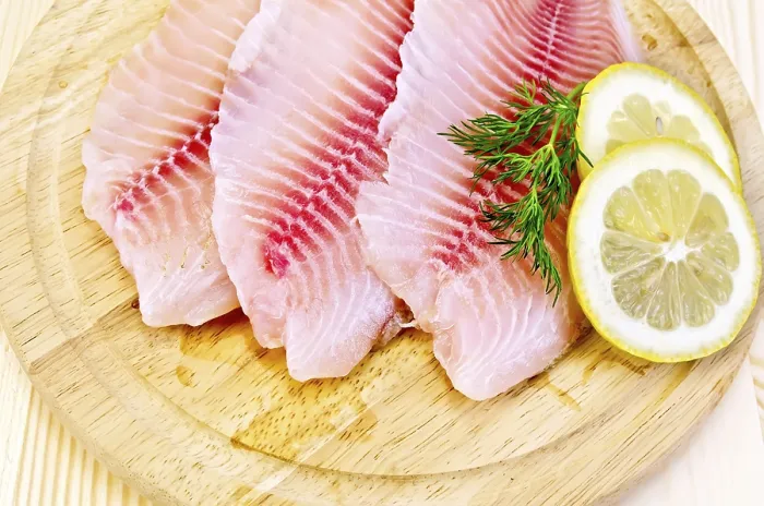 Gerahmter Druck : Tilapia-Filets mit einem Spritzer Dill. Gerahmter Druck : Tilapia-Filets mit einem Spritzer Dill.
