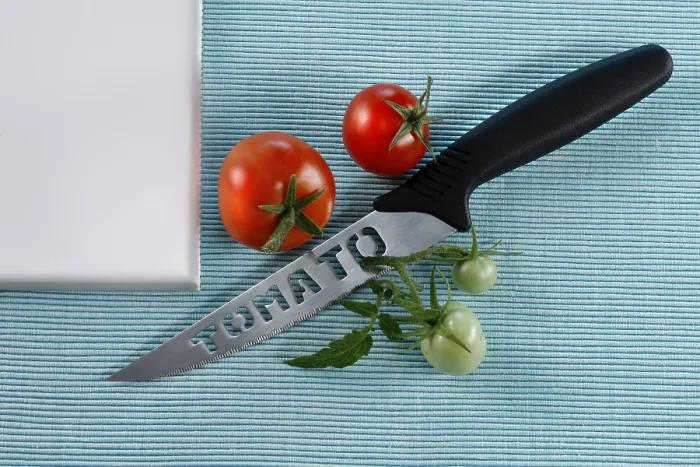 Gerahmter Druck : Tomaten mit einem Tomatennachtker. Gerahmter Druck : Tomaten mit einem Tomatennachtker.