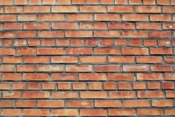Gerahmter Druck : Mauer aus roten Ziegeln.