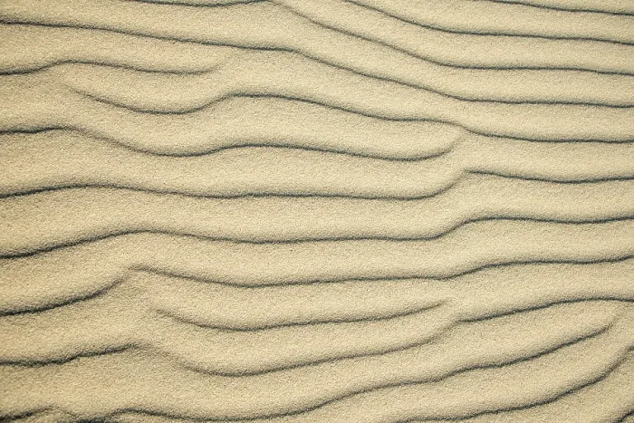 Gerahmter Druck : Wellenmuster in leuchtendem Sand, Sandfly Bay Gerahmter Druck : Wellenmuster in leuchtendem Sand, Sandfly Bay