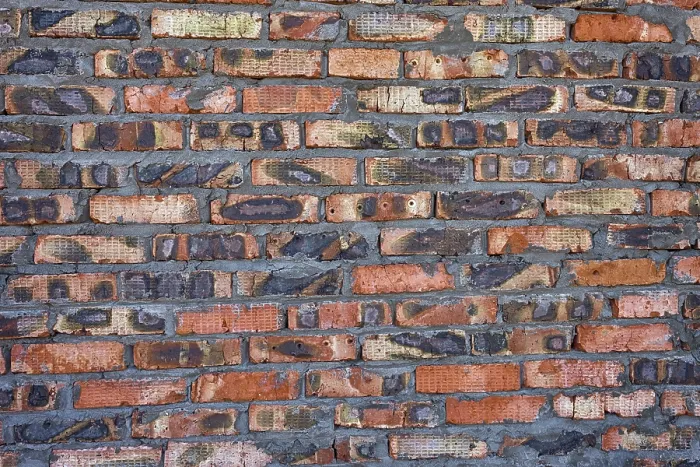 Gerahmter Druck : Verwitterter roter Backsteinwand als Hintergrund.