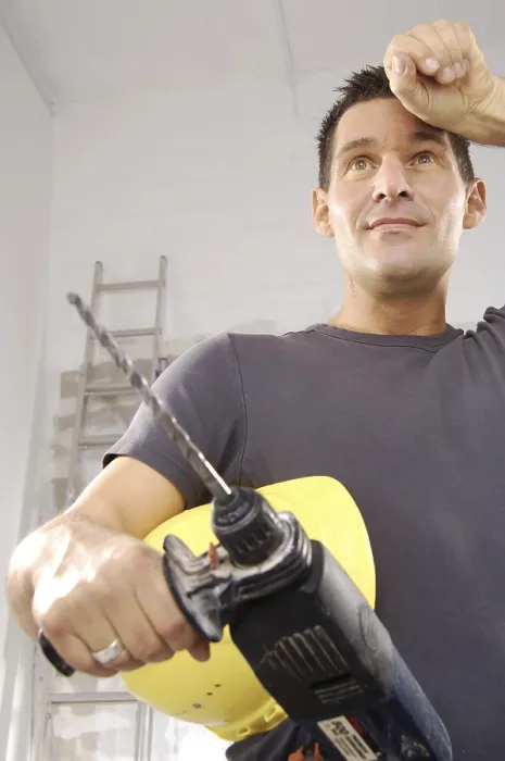 Gerahmter Druck : Arbeiter mit Bohrmaschine. Gerahmter Druck : Arbeiter mit Bohrmaschine.