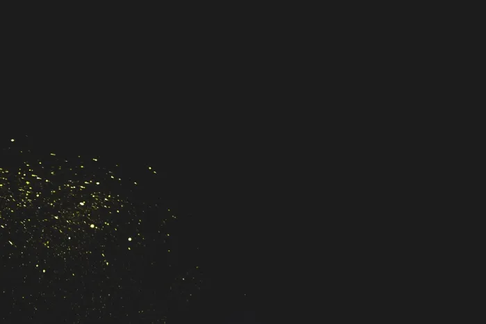 Gerahmter Druck : Gelbe Glitzer auf schwarzem Hintergrund. Gerahmter Druck : Gelbe Glitzer auf schwarzem Hintergrund.