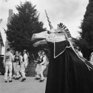 Print of a Unicorn with Morris Men in Stick Dance at Arkesden, 1954 Print of a Unicorn with Morris Men in Stick Dance at Arkesden, 1954