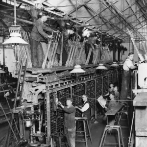 Print of Railway Workers Constructing a Locking Frame, September 1936 Print of Railway Workers Constructing a Locking Frame, September 1936