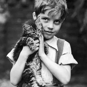 Child Holding a Kitten Print Child Holding a Kitten Print