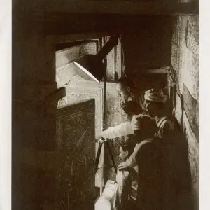 Howard Carter Inspects Tutankhamen's Sarcophagus Print Howard Carter Inspects Tutankhamen's Sarcophagus Print