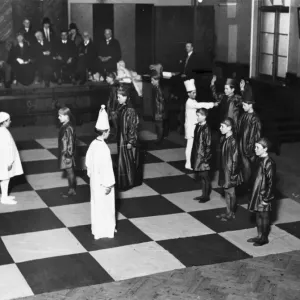 Print of Boys as Chessmen in a Living Match Print of Boys as Chessmen in a Living Match