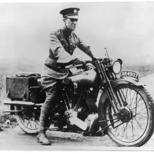 Print of T.E. Lawrence in RAF uniform on a Brough Superior SS100 motorbike