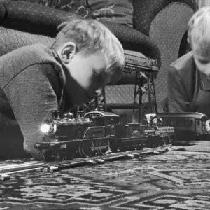 Vintage Print of Two Boys with a Model Train Set Vintage Print of Two Boys with a Model Train Set