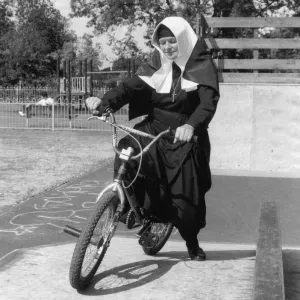 Nun on a Bicycle Print, circa 1970s Nun on a Bicycle Print, circa 1970s