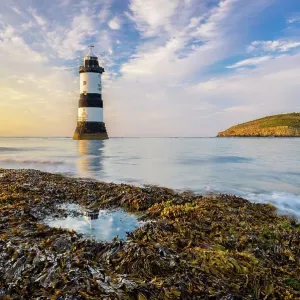 Trwyn Du Lighthouse at sunset, Llangoed, Gwynedd, Anglesey, Wales, Great Britain, United Kingdom