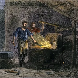 Blacksmith and his assistant at a forge Print Blacksmith and his assistant at a forge Print