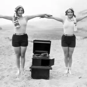 Joan Crawford and Dorothy Sebastian with a Portable Phonograph Print Joan Crawford and Dorothy Sebastian with a Portable Phonograph Print