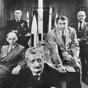 Black and white print of Hermann Oberth with officials Black and white print of Hermann Oberth with officials