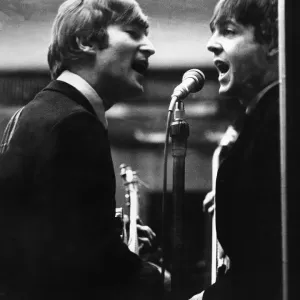 Print of John Lennon and Paul McCartney in a recording studio Print of John Lennon and Paul McCartney in a recording studio