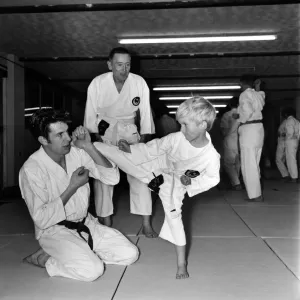Black and white photograph print of a young boy in karate stance Black and white photograph print of a young boy in karate stance