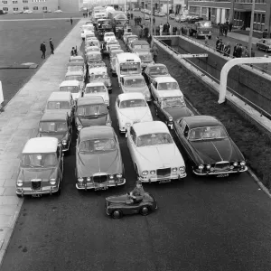 Print of a 1967 photograph showing Patrick Edwards in the smallest BMC car Print of a 1967 photograph showing Patrick Edwards in the smallest BMC car