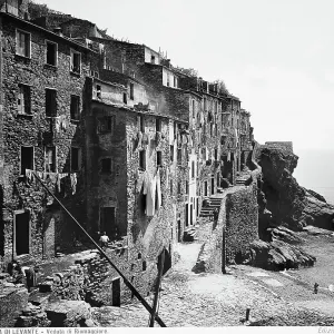 Panoramic view of the village of Riomaggiore, one of the Cinque Terre, near La Spezia Panoramic view of the village of Riomaggiore, one of the Cinque Terre, near La Spezia
