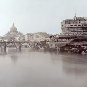 Castel Sant'Angelo and the bridge of the same name in Rome.In the background the dome of Saint Peter's Castel Sant'Angelo and the bridge of the same name in Rome.In the background the dome of Saint Peter's