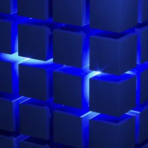 Kubusstrukturen erzeugen eine fesselnde geometrische Anordnung, die durch blaue Licht hervorgehoben wird. Kubusstrukturen erzeugen eine fesselnde geometrische Anordnung, die durch blaue Licht hervorgehoben wird.