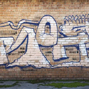 Graffiti Print on Brick Wall
