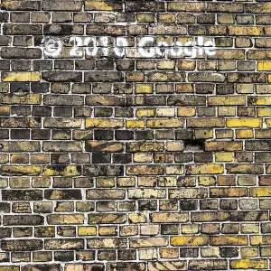 Old Brick Wall Print with Google Graffiti Closeup Old Brick Wall Print with Google Graffiti Closeup
