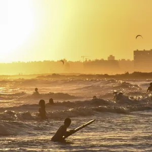 People Bathing on Beach at Sunset Print, Montevideo, Uruguay People Bathing on Beach at Sunset Print, Montevideo, Uruguay