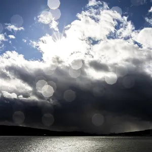 Sun Rays Break Through Clouds Print